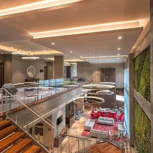 Hilton Garden Airport Отель